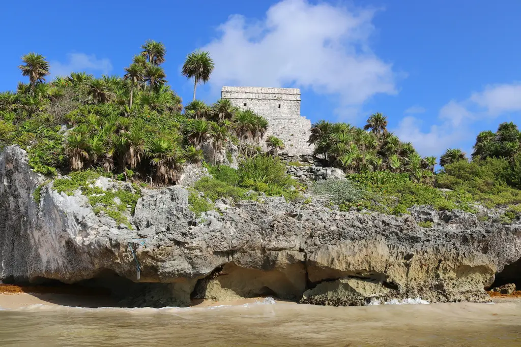 Tulum coastline with jungle over the rocks