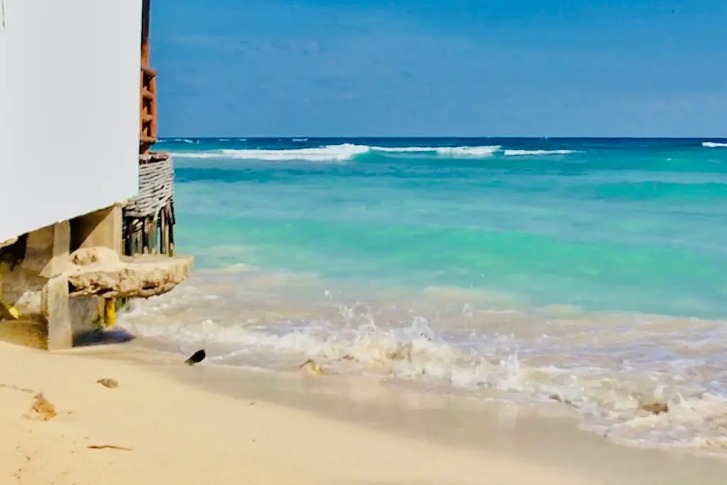 White wooden house on the beach in Playa del Carmen
